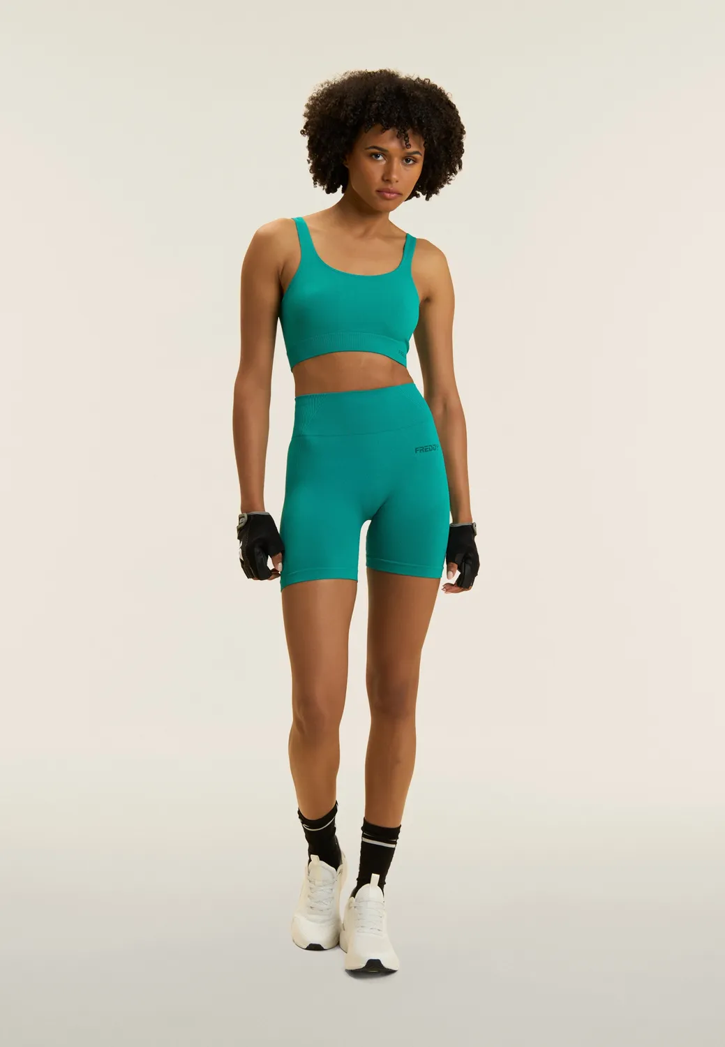 Freddy Seamless Sporttop Ocean Cavern mittlerer Halt Ripp-Bund