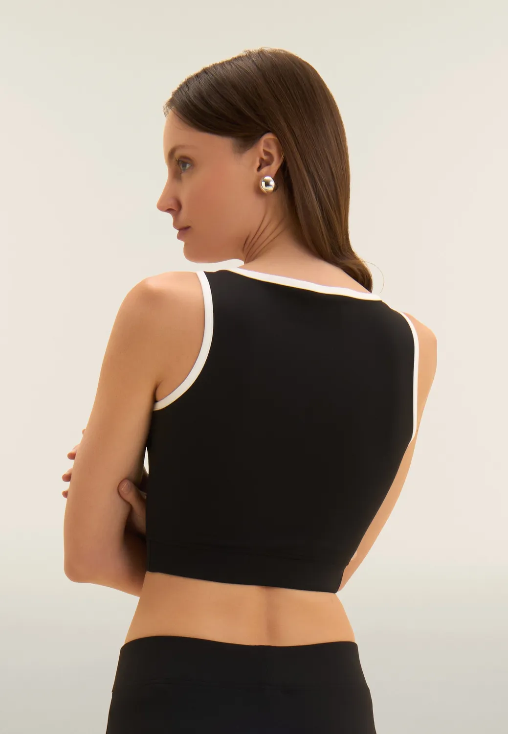 Freddy MST Cropped Sporttop Schwarz-Weiß mittlere Stütze