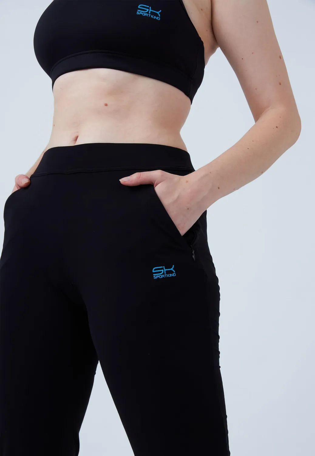 SPORTKIND Trainingshose lang schwarz Reiverschlusstaschen